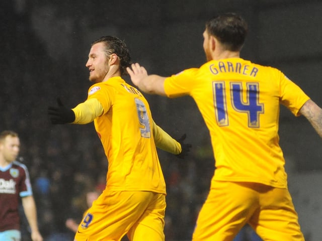 Preston North End's Will Keane, left, celebrates scoring the opening goal with team-mate Joe Garner