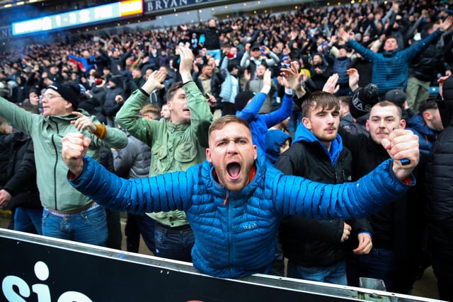 Preston North End fans celebrates their third goal.