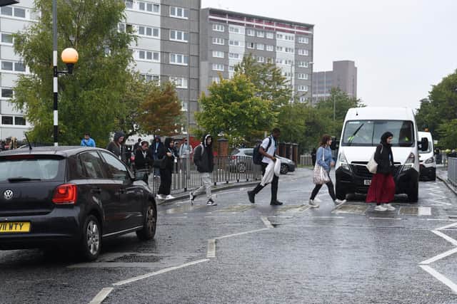The crossing is notoriously busy during college term time - but Cardinal Newman was shut for the summer when Talha had his accident