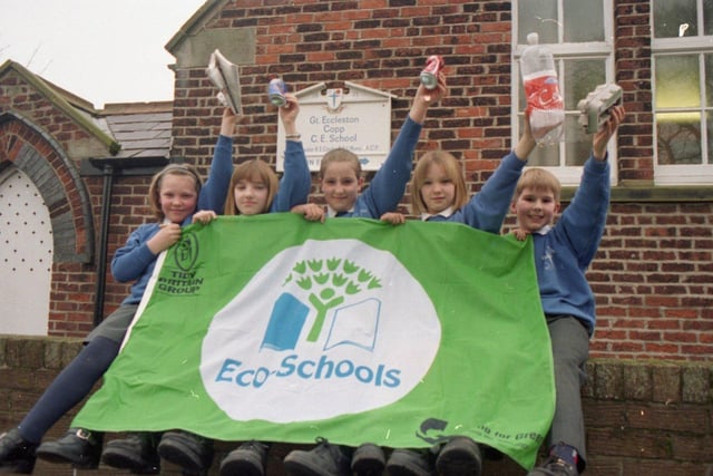 Pupils at a rural Lancashire school are waving the green flag for the environment after winning a national energy saving competition. Great Eccleston Copp CE School, near Preston, took top science honours in the Powersavers competition and picked up a trophy and £750 cash prize for the school. Pictured (from left): Stephanie Ball, Rebecca Holder, Emma Lowe and Thomas Bamber