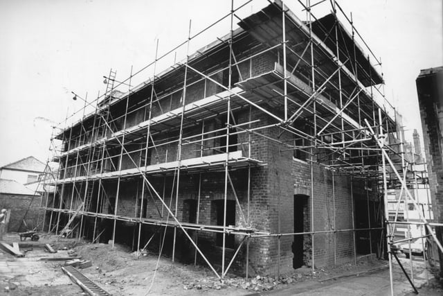 Scaffolding covers the entirety of this building which is located to the west side of the old Starkies Wire Works, off Church Street, Preston. It is part of the Cotton Court redevelopment plan in 1989
