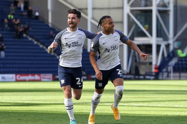 Cameron Archer celebrates with Sean Maguire after scoring Preston North End's second goal against Queens Park Rangers at Deepdale