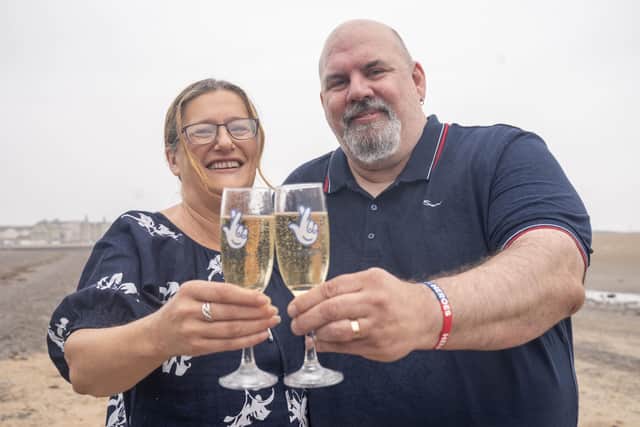 Helen and Lee Kuchczynski, from Cumbria, during a photo call to celebrate their £3.6 million EuroMillions win, in Morecambe, Lancashire. Picture date: Friday July 22, 2022. PA Photo. See PA story LOTTERY EuroMillions. Photo credit should read: Danny Lawson/PA Wire