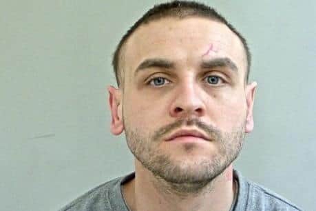 Clayton Campbell is wanted for non-fatal strangulation, actual bodily harm and more (Credit: Lancashire Police)