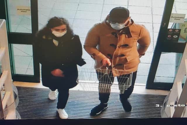 Police want to speak to these two people after a pensioner's bank card was stolen in Ormskirk. (Credit: Lancashire Police)