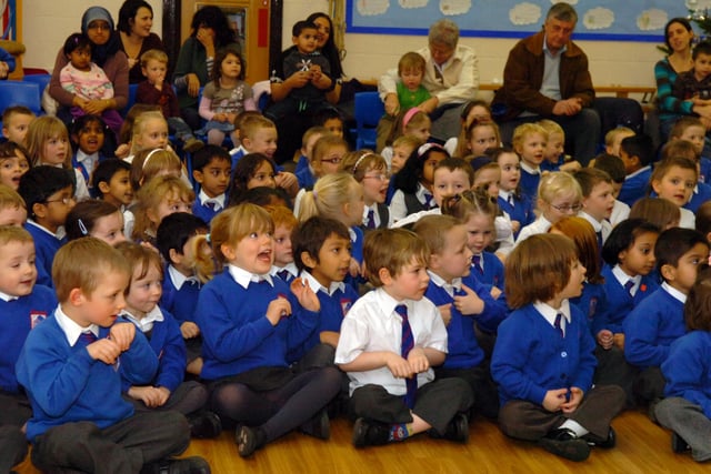 Audience members at Sherwood Primary School sit rapt as they watch Molly Muddle and her friends