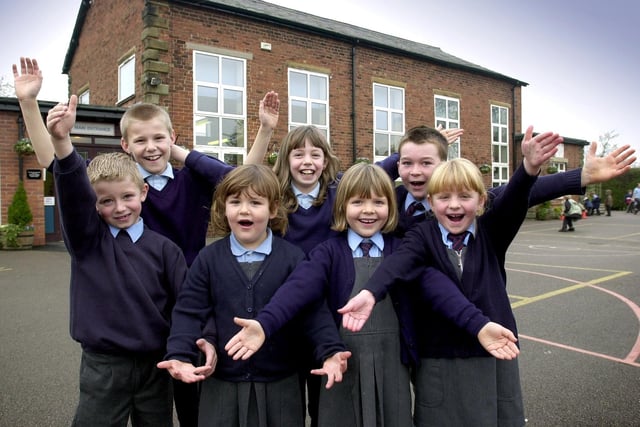 Pupils from Hoole St Michael's C of E Primary School, from left, Harry Fearn, seven, Gary Hughes, 10, Emma Rooke, four, Jacqui Foy-Taylor, 10, Sarah Tugman, five, Chris Mee, eight, and Alice Thomas, six, who, with the rest of the school, will be taking part in a nationwide simultaneous sing song for a Guinness World record attempt