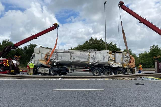 The milk tanker is righted on the M6 near Preston after the incident early this morning