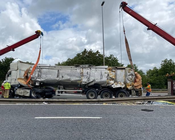 The milk tanker is righted on the M6 near Preston after the incident early this morning