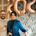 Happy New Year! Owners Catherine and Paul Hollingshead raise a glass