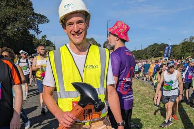 Anwyl’s John Sutton took part in the Great North Run wearing safety boots and a hard hat