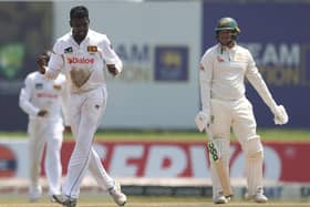 Euxton pro Nishan Peiris (left)