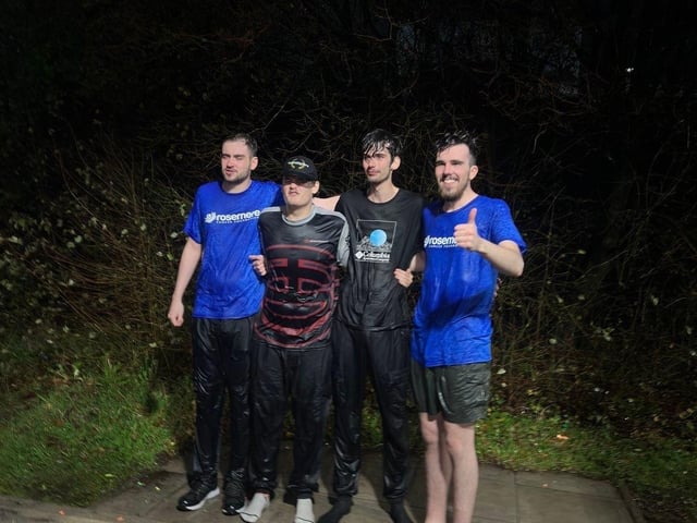Drenched after their “Soak the Instructor Challenge” are, from the left, Liam, Josh, Dylan and Declan