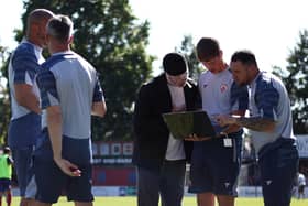 Ashvir Singh Johal and Morecambe's coaching staff return to league matters on Saturday Photo: James Fearn/Getty Images