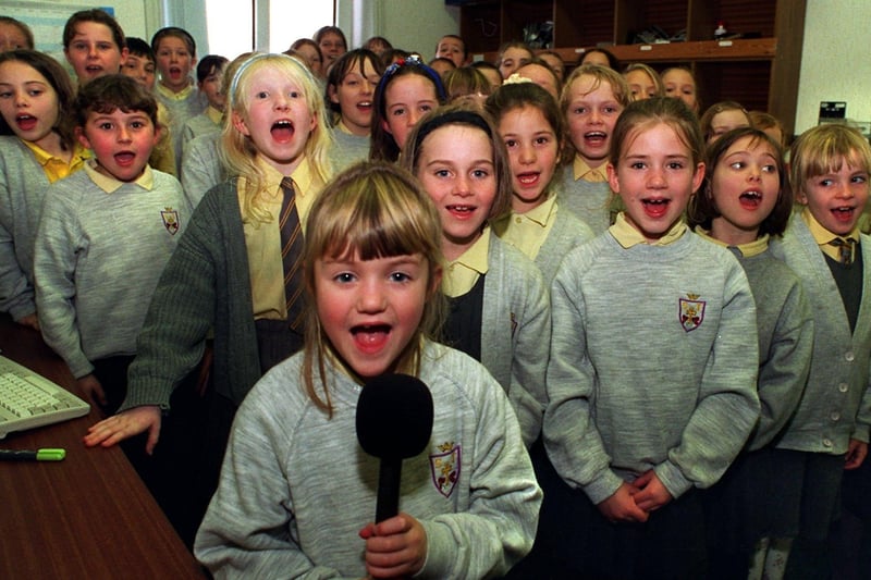 Pupils from St.Theresa's Primary School, Penwortham, recording Christmas music at Howick House, Blind Welfare. Leading the singing at the front is pupil Emma Baines, aged eight