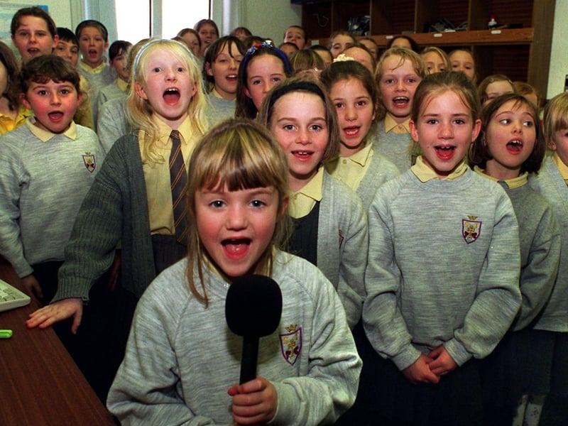 Pupils from St.Theresa's Primary School, Penwortham, recording Christmas music at Howick House, Blind Welfare. Leading the singing at the front is pupil Emma Baines, aged eight