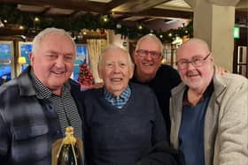 Former Burnley Express photographer Eddy Rawlinson (second from left) with Stuart Mason(left) an ex Burnley Express photographer who also worked for 
The Sunday Express  and the Daily Express,  Barry Greenwood (right) and Phil Spencer who are both ex Daily Mirror photographers.