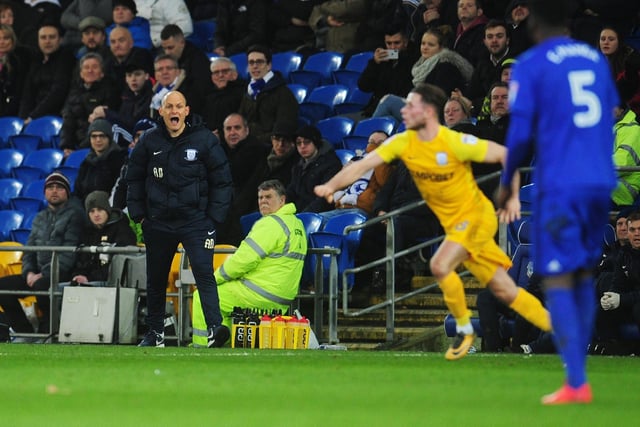 Preston North End manager Alex Neil shouts instructions to his team from the dug-out.