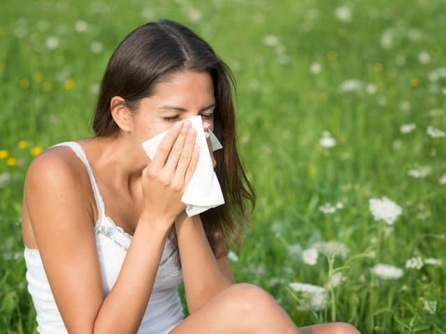 Symptoms of hay fever include coughing, sneezing and itchy eyes.