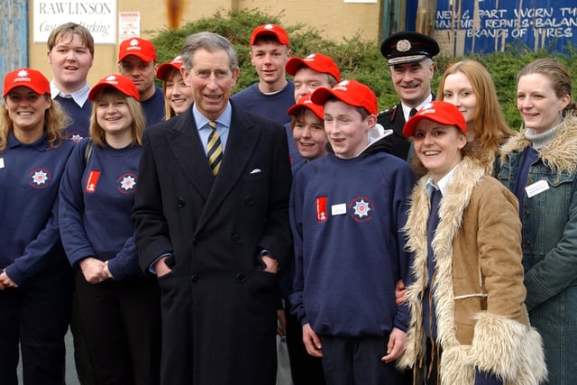 Prince Charles with members of the Prince's Trust Volunteers in Preston, 2003