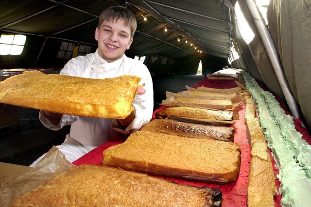 Chef Stefan Moverley with part of the record breaking World's longest cake he helped to bake  for charity at the Old Rectory, Handsworth, Sheffield  in  2001