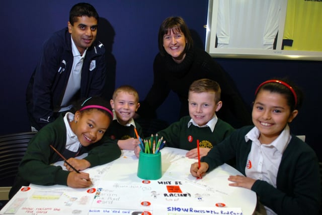 Local schoolchildren were giving racism the red card at Preston North End Football Club. Ilyas Patel the PNE social inclusion officer and Rebecca Barnes the year 4 class teacher at St. Gregory's Catholic Primary School, Deepdale, with pupils Layla Carlisle, Luke Cogle, Matthew Lewis and Aaliyah Shah