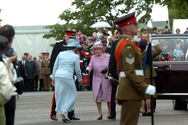 The Queen is greeted at Fulwood Barracks in 2008 watched by crowds in the background