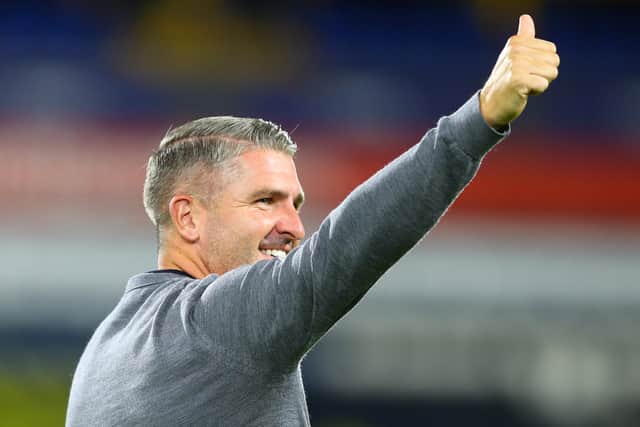 Ryan Lowe salutes the fans after the game.