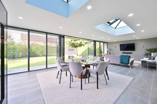 Modern open-plan mansion with home bar, games room, gym, and huge