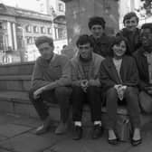 This group are gathered on Preston's Flag Market - but why? Let us know.