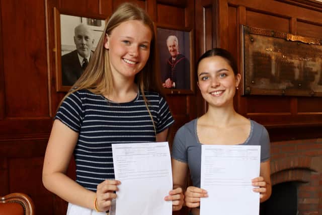 Students at Kirkham Grammar School with their A-level results.