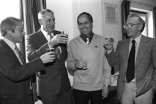 Gordon Lee has a celebratory drink with PNE directors after signing as their new manager