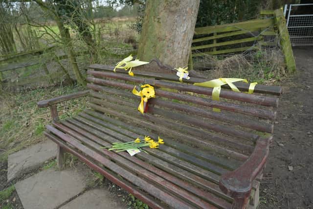 Flowers, and ribbons tied to a bench by the River Wyre in St Michael's on Wyre where Nicola's phone and her dog's harness were found on the morning she disappeared on January 27