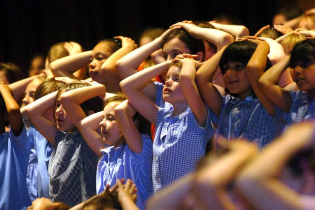 Hands on heads at Preston Schools Music Festival - but what song were they singing?