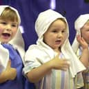 Children signing "Twinkle Twinkle Little Star" for their concert at Ashcroft Day Nursery, Whitegate Drive, Blackpool, 2002