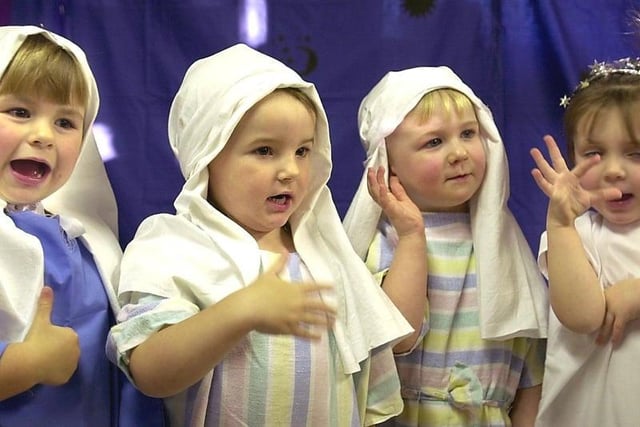 Children signing "Twinkle Twinkle Little Star" for their concert at Ashcroft Day Nursery, Whitegate Drive, Blackpool, 2002