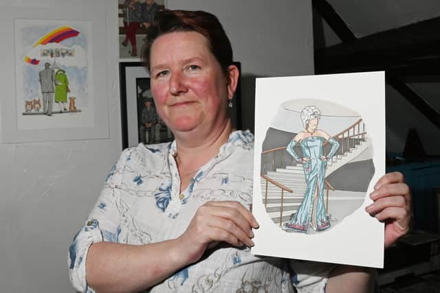 Artist Angela Davies from Heskin, Chorley, with her tribute to Lily Savage, to mark the death of Paul O'Grady