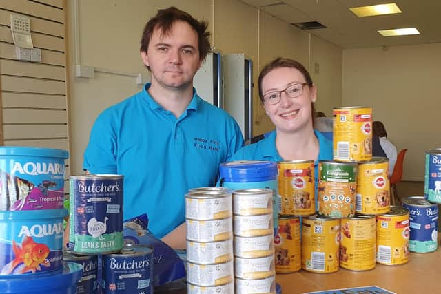 Jennifer and Daniel Endresz at Happy Pets Food Bank