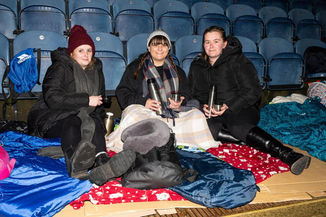 Rachel Robinson, Michelle Iddon and Stephanie Robinson all brought thermos flasks to help keep them warm during the Big PNE Sleep Out. Photo: Kelvin Lister-Stuttard
