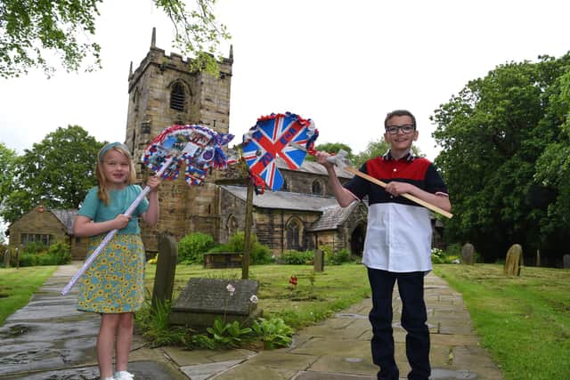 Photo Neil Cross; 270 horses heads on display at St Mary's Penwortham to mark the Queen's Platinum Jubilee - winners Jack Smith of Cop Lane C of E and Phoebe Robinson of Howick C of E