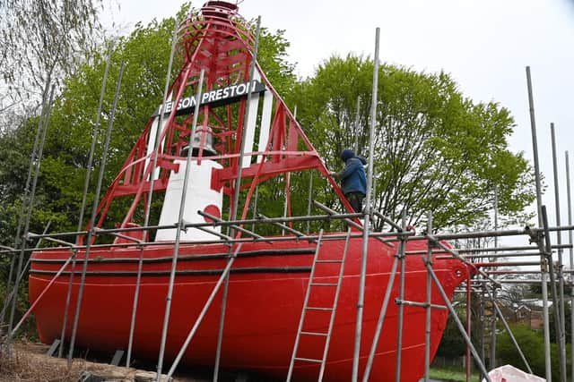 Scaffolding being removed from the Preston Docks landmark.