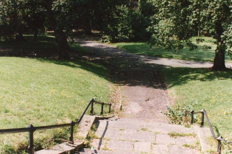 Steps down to a shaded pathway on Avenham Park, Preston