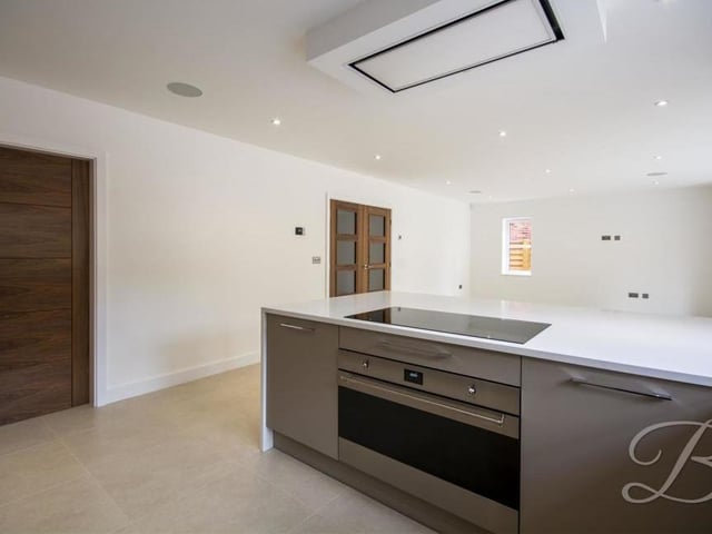 A third view of the kitchen which, like the rest of the house, is immaculately presented.