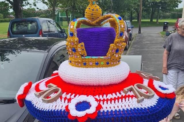 The crocheted 'Crown Jewels' were removed from a post box in Hoghton late Thursday evening and found a short time after strewn over a hedge
