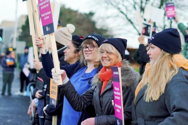 Nurses stand on the picket line at Royal Devon and Exeter Hospital in Wonford, December 20 2022. See SWNS story SWBNnurses