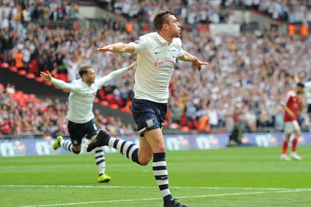 Paul Huntington celebrates scoring in Preston North End's League One play-off final win over Swindon at Wembley