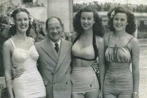Contestants at the first Miss Great Britain pageant at Morecambe in 1945 with winner Lydia Reid in a white swimsuit.