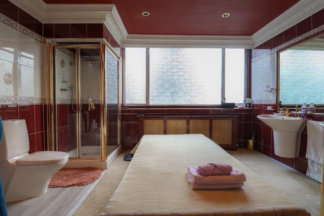 There are four bathrooms in the house.
