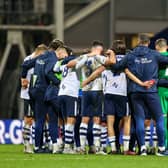 Preston North End players huddle after the match against Luton Town