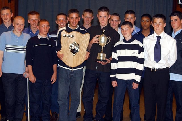 Preston Schools Under 15s captain Danny Barnes, and vice-captain Phil Brierley, with their team mates who won the Lancashire Cup and the Lancashire League Trophy
